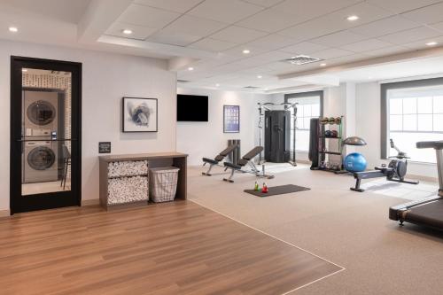 a gym with treadmills and cardio equipment in a room at Home2 Suites By Hilton Kittery in Kittery