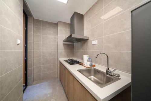 Kuchyň nebo kuchyňský kout v ubytování Hexu Yanju Hotel