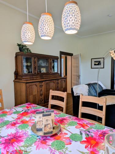 a room with a table with a tablecloth on it at Wein- und Landhaus S A Prüm in Bernkastel-Kues