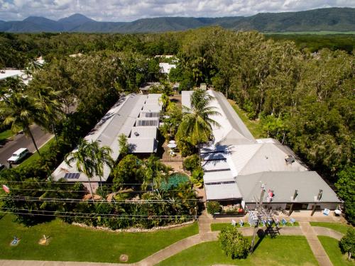 an overhead view of a building with a roof at Coral Beach Lodge in Port Douglas