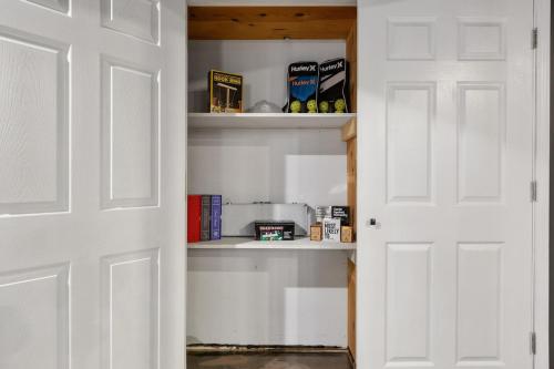 a closet with white walls and a white door at Bourbon Trail-Speakeasy&Golf&Spa&Dog Friendly in Frankfort