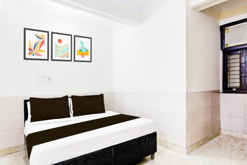 Postel nebo postele na pokoji v ubytování Super Hotel O Fazalpur