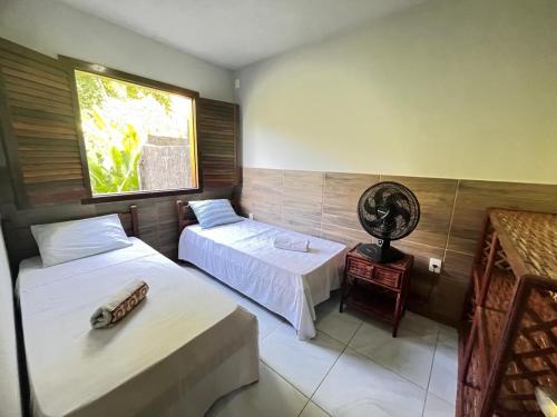 Postel nebo postele na pokoji v ubytování Refúgio da natureza em Morro de São Paulo