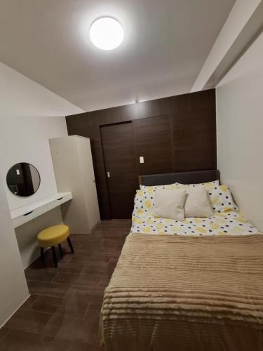 Postel nebo postele na pokoji v ubytování Condo in Makati