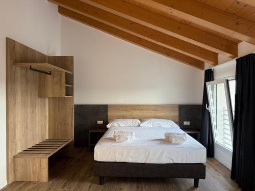 Ένα ή περισσότερα κρεβάτια σε δωμάτιο στο Agriturismo Come Na Volta