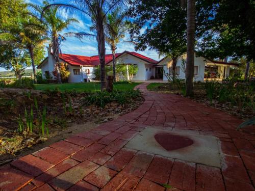 Κήπος έξω από το Merwenstein - Farm House, Cottages, Studio-Units