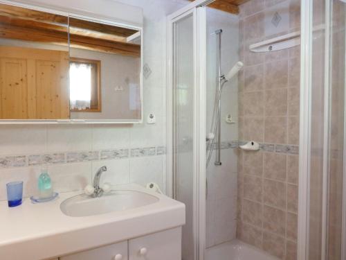 a bathroom with a sink and a shower at Holiday Home Rustico dell'Orino by Interhome in Alpe di Scieru