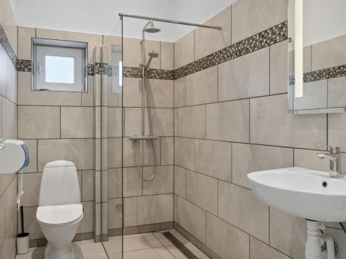 Koupelna v ubytování Holiday Home Bjarka - 700m from the sea by Interhome