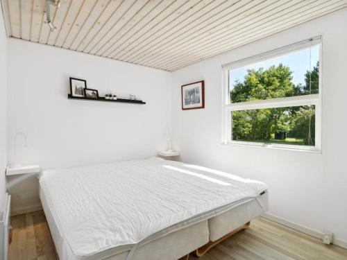 Katil atau katil-katil dalam bilik di Holiday Home Felippa - from the sea by Interhome