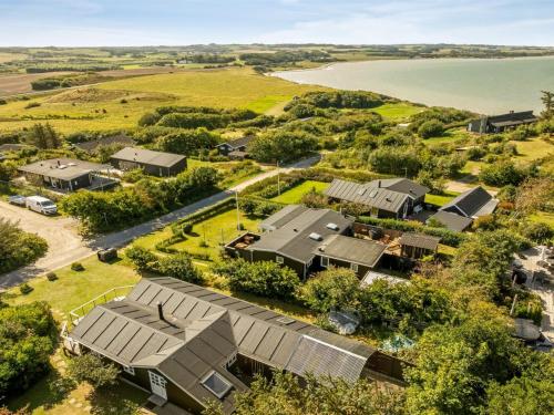 an aerial view of a house with a yard at Holiday Home Engelbertine - 210m to the fjord by Interhome in Struer