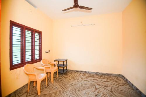 Fotografie z fotogalerie ubytování White Pearl Homes v destinaci Kuttalam