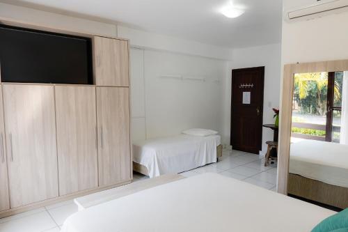Postel nebo postele na pokoji v ubytování Pousada Porto dos Casais