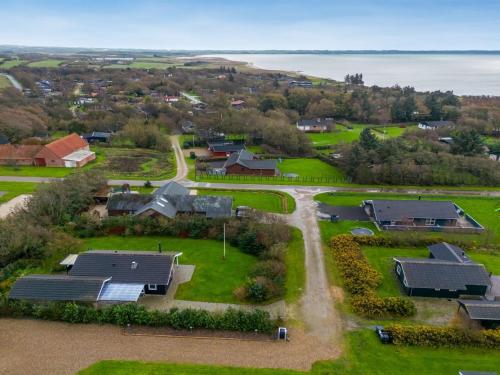 an overhead view of a house with a park at Holiday Home Ensio - 300m to the fjord by Interhome in Vinderup