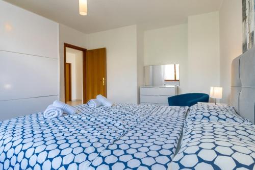 Katil atau katil-katil dalam bilik di Holiday House Ninetta