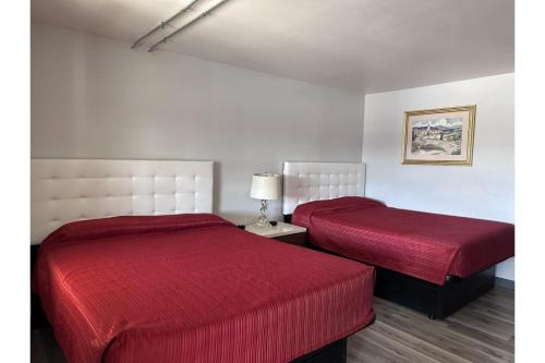 Capital O Elite Inn & Suites South Holland I 94にあるベッド