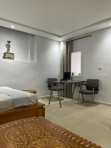 Ένα ή περισσότερα κρεβάτια σε δωμάτιο στο oasis Cozy Suite