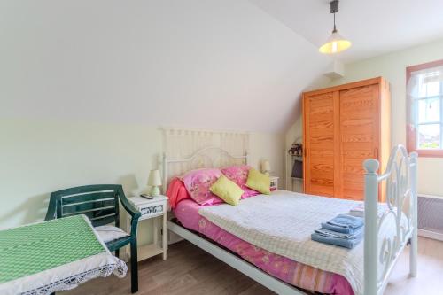 Postel nebo postele na pokoji v ubytování Le Pesquit - Chambre d'hôtes