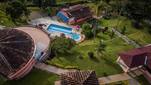 an aerial view of a house with a swimming pool at Escape to Nature in Copacabanas Hidden Gem in Copacabana