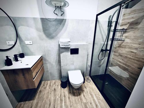 Ένα μπάνιο στο Nowoczesny Apartament