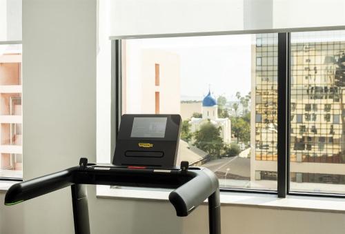 a computer monitor in a room with a window at Radisson Hotel Tunis, City Center in Tunis