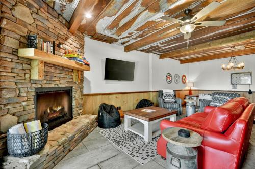 a living room with a couch and a fireplace at Stardust Ridge in Northcutt