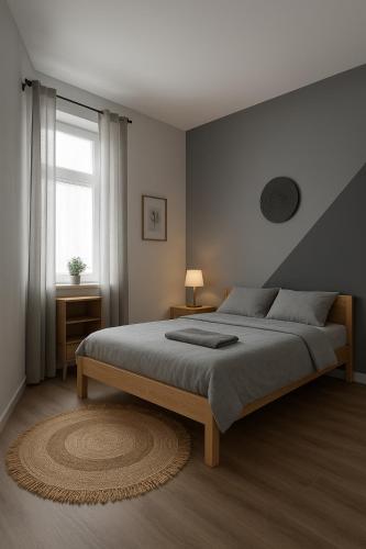 a bedroom with a large bed and a window at Location saisonnière Caza Villana in Rodrigues Island