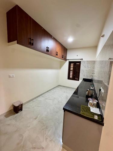 Kuchyň nebo kuchyňský kout v ubytování Pinto Eden Home Stay