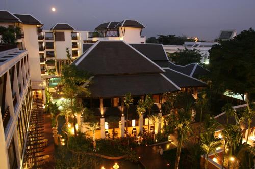 an aerial view of a building at night at Rarin Jinda Wellness Spa Resort in Chiang Mai