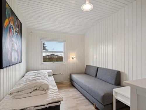 Ένα ή περισσότερα κρεβάτια σε δωμάτιο στο Holiday Home Gudrun - 250m from the sea by Interhome