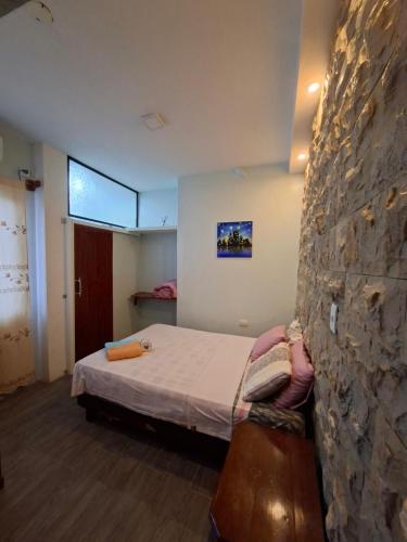 Ένα ή περισσότερα κρεβάτια σε δωμάτιο στο Casa Scalesia