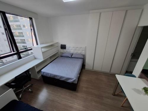 Postel nebo postele na pokoji v ubytování Conjunto Estúdio e Duplex Selenita by Alpha-StayService