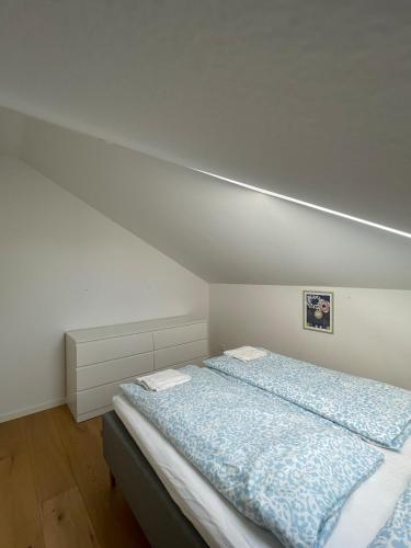 Una cama o camas en una habitación de Luxury appartment in the embassy-area in Hellerup