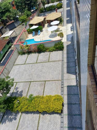 an overhead view of a roof with a swimming pool at ApUbatuba in Ubatuba