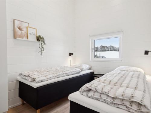 Ένα ή περισσότερα κρεβάτια σε δωμάτιο στο Holiday Home Lanessa - 800m from the sea by Interhome