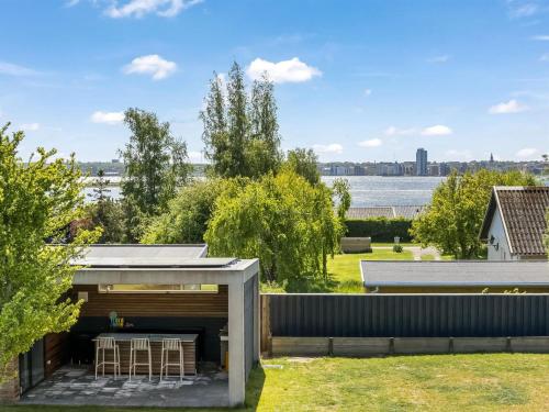 a view of the backyard of a house at Holiday Home Edvia - 200m to the fjord by Interhome in Holbæk