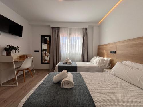 Katil atau katil-katil dalam bilik di Hostal Hs Puerto Lumbreras