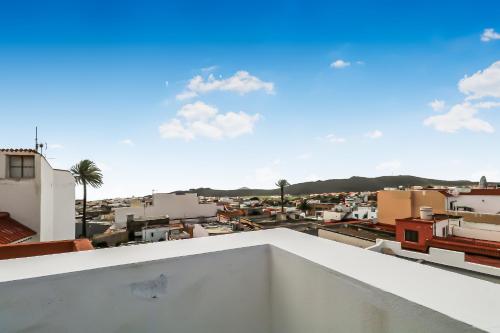 a view of a city from the roof of a building at Casa Bonita Peaceful Home in Ingenio