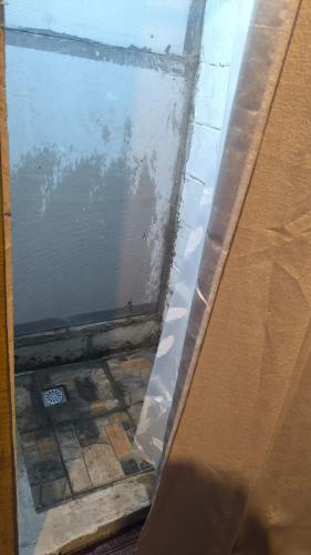 a door with a view of a floor at LA CASA DE DON MATILDE h3 in San Pedro Sula