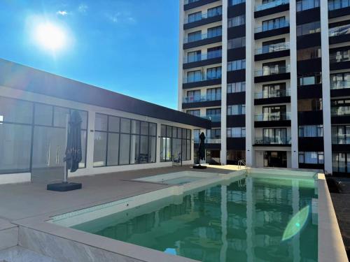 Kolam renang di atau dekat dengan Nairobi comfy JKIA Apartments