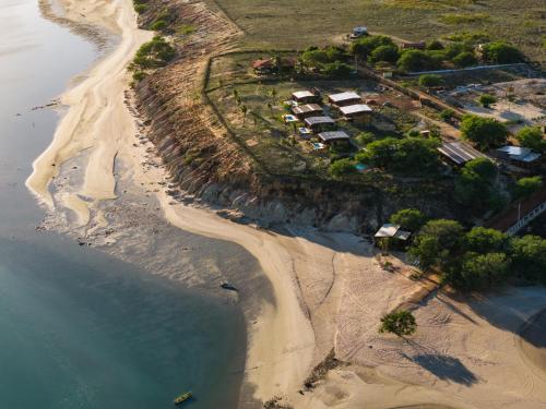 an aerial view of a beach with a resort at Soledade Bangalôs - Kauli Seadi in Macau