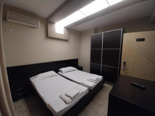 Cama o camas de una habitación en Danis Hotel