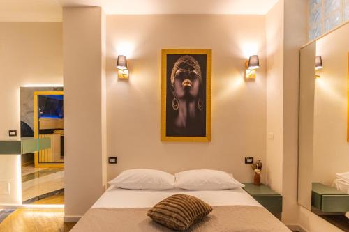 Ένα ή περισσότερα κρεβάτια σε δωμάτιο στο VBM SUITE & SPA Apartments