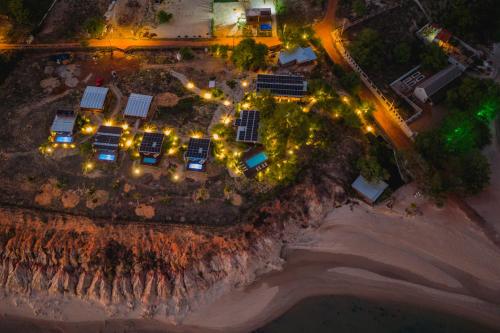 an aerial view of a solar farm with lights at Soledade Bangalôs - Kauli Seadi in Macau