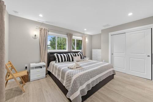 a bedroom with a large bed and a window at Sugarfish in Sanibel Island