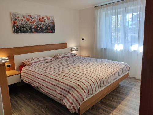 Ένα ή περισσότερα κρεβάτια σε δωμάτιο στο Cucal Apartment - Varena