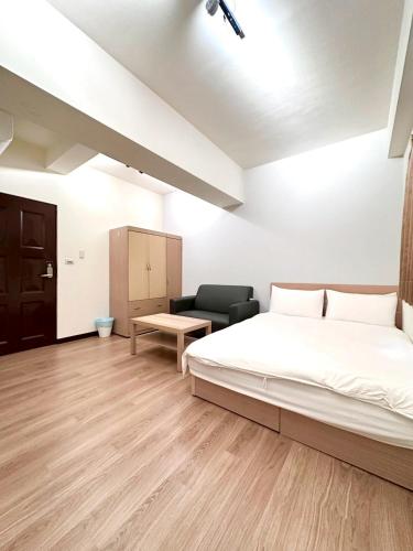 Una cama o camas en una habitación de 理想家