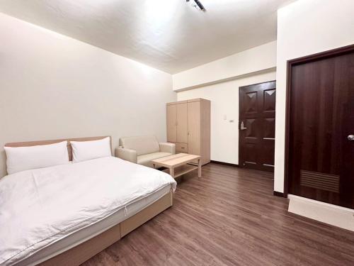 Una cama o camas en una habitación de 理想家
