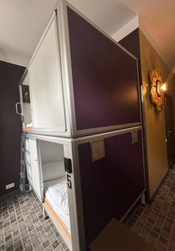 Postel nebo postele na pokoji v ubytování Singer109 Hostel, Hotel & Apartment
