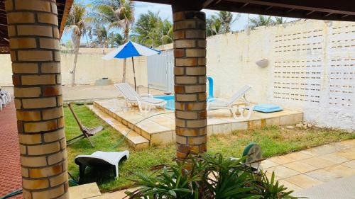 Piscina en o cerca de Maravilhosa casa com piscina