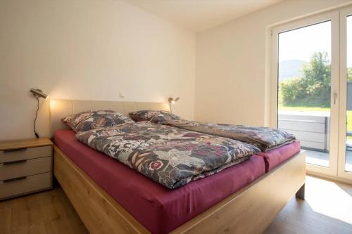 Ένα ή περισσότερα κρεβάτια σε δωμάτιο στο Ferienhaus Lautenbach